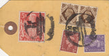 134396 UNDATED PARCEL TAG KGVI 1942 10S ULTRAMARINE (SG478b) BLOCK OF FOUR, 5S RED (SG477) AND LOW VALUES.