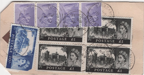 137712 1969 BANKERS 'HIGH VALUE PACKET' REGISTERED PARCEL LABEL WITH CASTLE ISSUE 10S AND £1 BLOCK OF FOUR.