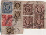 140044 1949 CUT OUT PIECES EX PARCELS WITH KGVI HIGH VALUES INCLUDING £1 BROWN (SG478c).