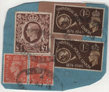 140044 1949 CUT OUT PIECES EX PARCELS WITH KGVI HIGH VALUES INCLUDING £1 BROWN (SG478c).