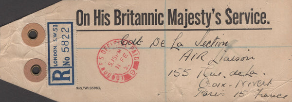 141253 1952 'On His Britannic Majesty's Service' PARCEL TAG SENT REGISTERED MAIL LONDON TO PARIS WITH KGVI ISSUES INCLUDING 10S ULTRAMARINE (SG511) AND £1 BROWN (SG512) X 3.
