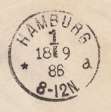 141556 1886 MAIL LONDON TO HAMBURG 1D PINK ENVELOPE UPRATED 1½d LILAC (SG188) HOSTER CANCELLATION.
