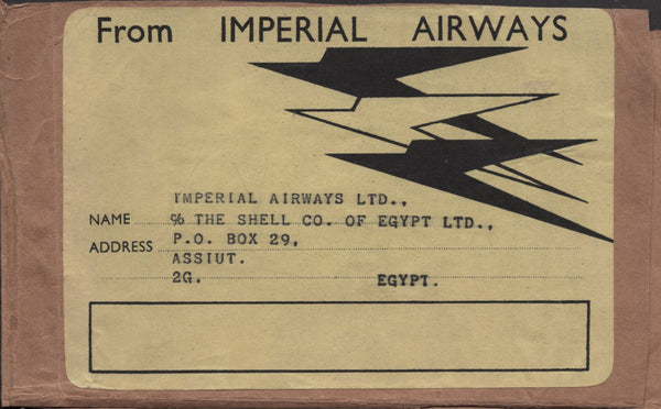 142016 1935 LARGE PART PARCEL WRAPPER AIR MAIL LONDON TO ASSIUT, EGYPT WITH SEAHORSES 5S (SG451), 10S (SG452) ALSO 5D , 9D AND 10D ISSUES.