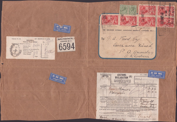 142021 1933 VERY LARGE PARCEL FRONT AIR MAIL LONDON TO SOUTHERN RHODESIA WITH SEAHORSE 5S (SG416) X 6 AND 9D X 2.