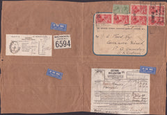 142021 1933 VERY LARGE PARCEL FRONT AIR MAIL LONDON TO SOUTHERN RHODESIA WITH SEAHORSE 5S (SG416) X 6 AND 9D X 2.