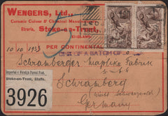 142037 1933 PARCEL POST TAG FROM STOKE ON TRENT TO GERMANY WITH 2/6 SEAHORSE (SG415a) X 2.