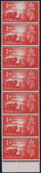 142535 1948 1D CHANNEL ISLES LIBERATION (SG C1) UNUSED VERTICAL STRIP OF SEVEN WITH PAPER JOIN.