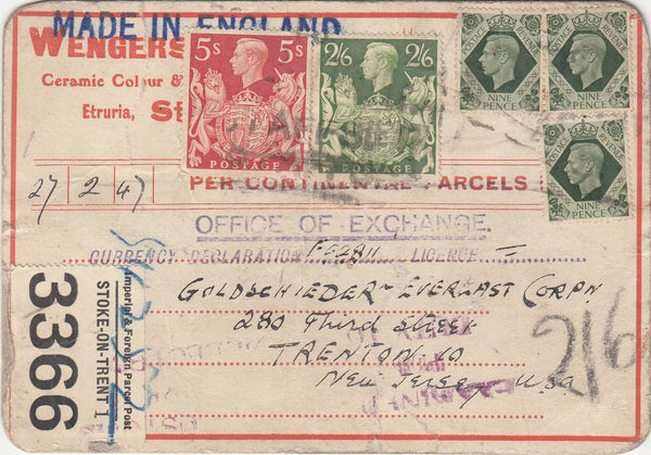 143582 1947 PARCEL POST TAG STOKE ON TRENT TO NEW JERSEY, U.S.A. KGVI 9d X 3, 2/6 YELLOW-GREEN (SG476b) AND 5s RED (SG477).