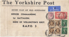 144035 1953 PARCEL LABEL AIRMAIL LEEDS TO 'B.A.P.O. 3' KGVI 6d, 1s BLOCK OF FOUR, 5s RED (SG510) AND QEII 1½d WILDING x 2.