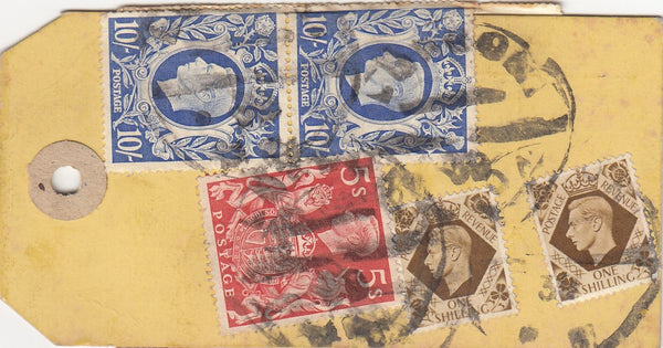 144123 CIRCA 1950 PARCEL TAG, NO ADDRESS ALTHOUGH 'TO MOSCOW (U.S.S.R.) IMPRINT KGVI HIGH VALUES INCL. £1 ROYAL SILVER WEDDING (SG494) BLOCK OF FOUR.