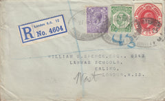 114938 1923 POSTAL STATIONERY CUTOUTS ON REGISTERED USAGE IN LONDON.