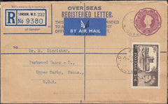 129770 1957 REGISTERED MAIL UK TO USA, TWO COVERS SHOWING AIR MAIL AND SEA MAIL RATES.