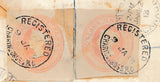134425 1890 PENNY POSTAGE JUBILEE, 1D BLUE ENVELOPE REGISTERED MAIL CHARING CROSS TO MONTREAL IN 1913 WITH TWO 1D PINK CUT OUTS PAYING REGISTRATION.