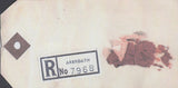 80943 1969 HIGH VALUE PACKET. Parcel tag with Arbroath registered label.