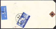93028 - 1969 unaddressed parcel tag with air mail labels b...