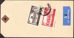 93032 - 1967 unaddressed parcel tag with air mail labels a...